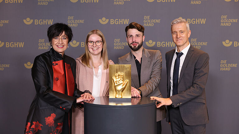 Preisübergabe der Goldenen Hand an 4 Personen