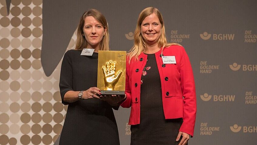 Preisübergabe der Goldenen Hand an Rewe Group