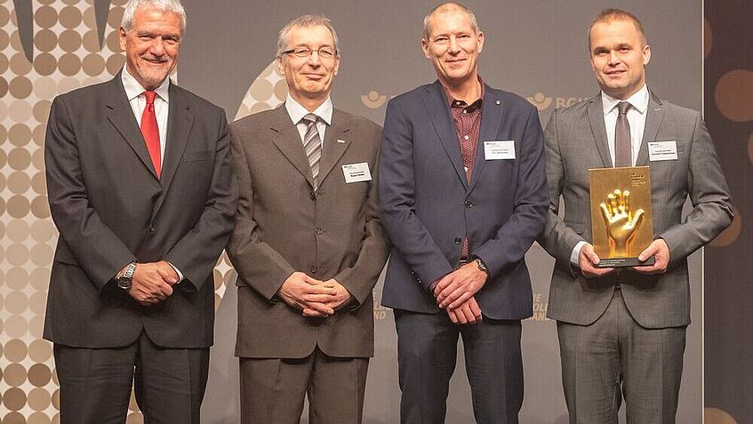 Preisübergabe der Goldenen Hand an Toom Baumarkt